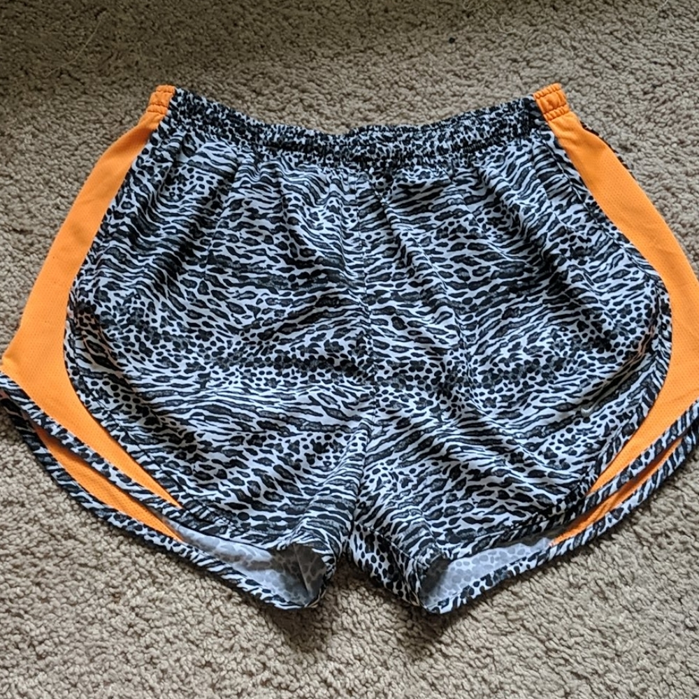 Nike Cheetah Print Mesh Athletic Shorts • M